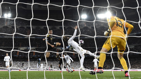 Gabriel Jesus scores against Real Madrid.