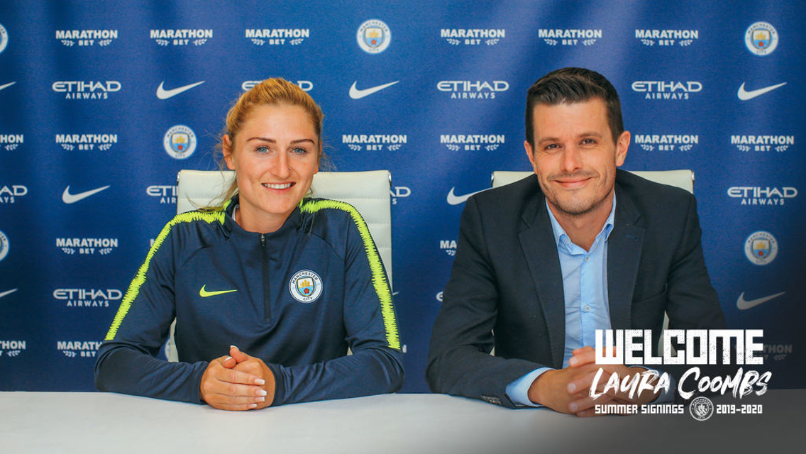 City sign Laura Coombs