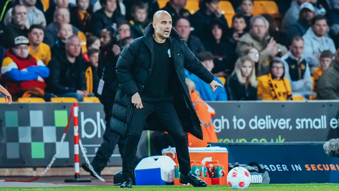THE BOSS: Guardiola watches on.