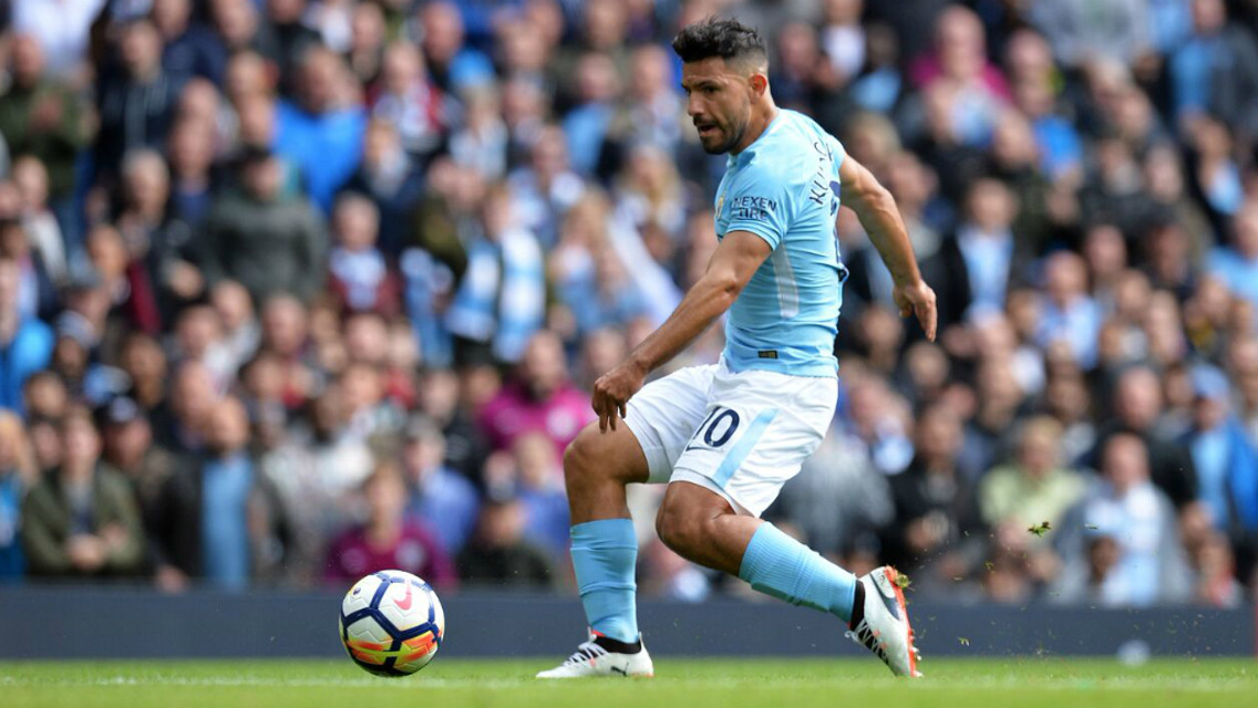 COMPOSURE: Sergio Aguero slots home, having rounded Simon Mignolet