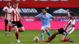 TRICK AND TREAT: Bernardo Silva dances through the Sheffield United ranks