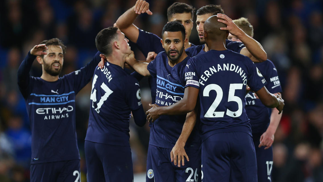 GROUP HUG: Mahrez feels the love!