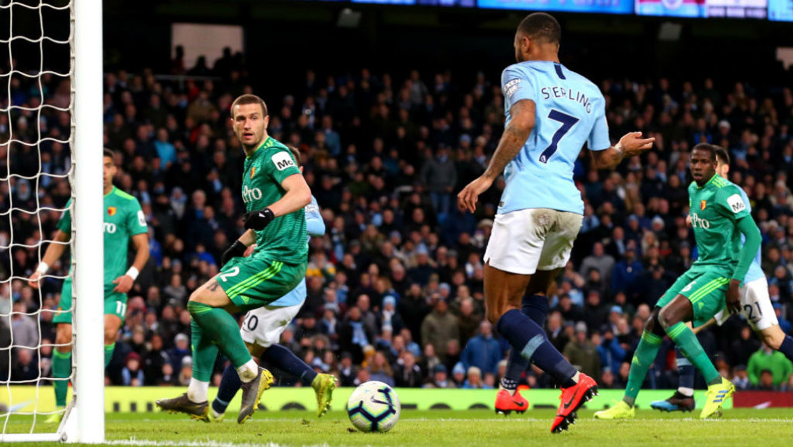 TWO'S COMPANY: Raheem slots home his and City's second goal after great work by David Silva and Riyad Mahrez