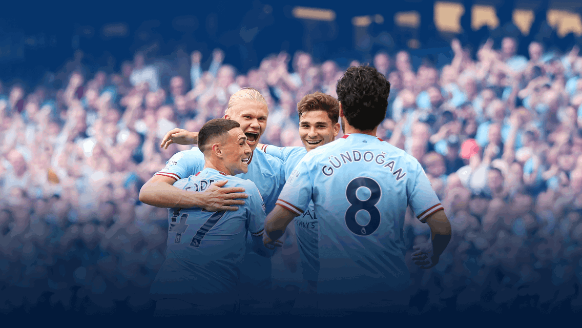 Manchester City players celebrating a goal in front of their fans. Visible players include Foden (47) and Gündoğan (8) from the back.
