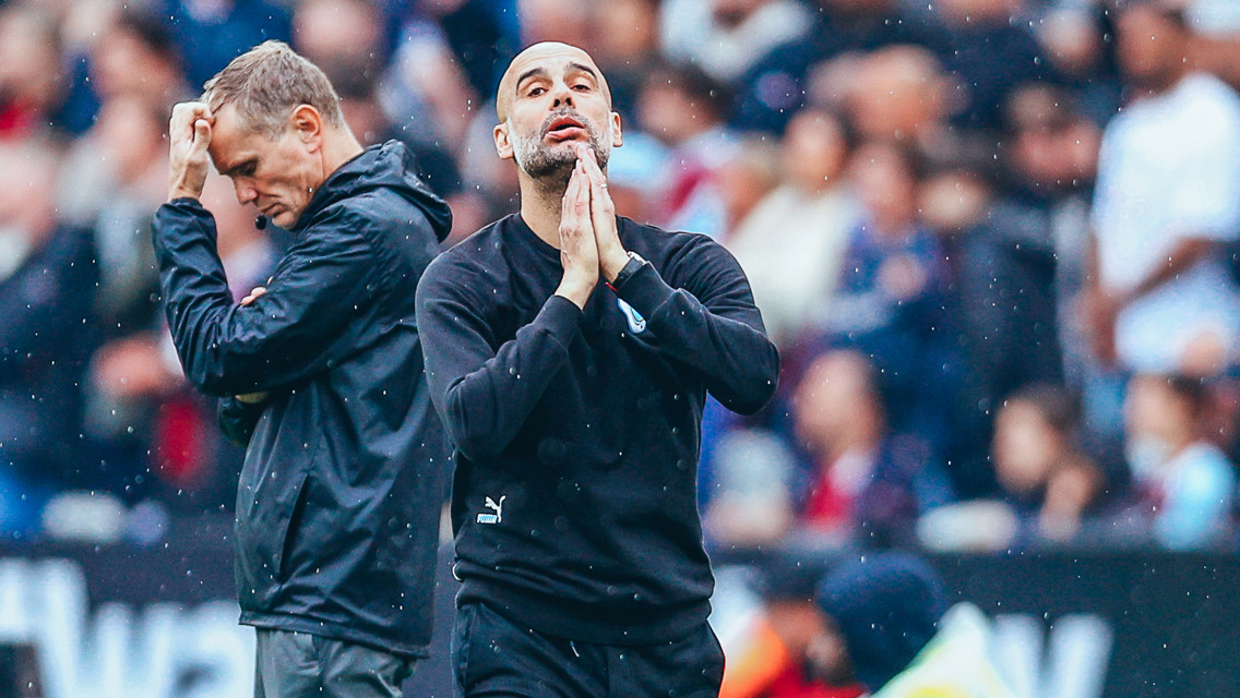 TENSE: The boss reacts on the touchline...